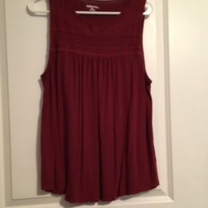 maroon sleeveless top with sheer inlay